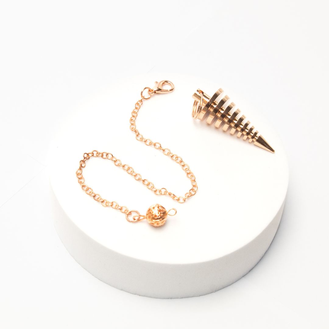 Péndulo Vórtice Oro Rosa